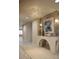 Stylish hallway featuring elegant decor, artwork, and modern lighting fixtures at 33 S Palm Ave # 1501, Sarasota, FL 34236