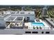 Rooftop pool and lounge area with city views, and plenty of seating for relaxing and entertaining at 33 S Palm Ave # 1501, Sarasota, FL 34236