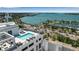 An aerial view of a rooftop pool with ocean views and easy access to the marina at 33 S Palm Ave # 1501, Sarasota, FL 34236