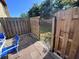 View of a fenced back yard with patio at 3473 Clark Rd # 171, Sarasota, FL 34231