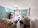 Comfortable living area with a ceiling fan and access to an outdoor patio area at 3473 Clark Rd # 171, Sarasota, FL 34231