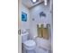 Cozy half-bathroom featuring nautical decor, new toilet, and stylish fixtures at 3701 5Th Ave # 1, Holmes Beach, FL 34217