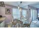 Cozy dining area featuring an elegant table setting and lots of natural light at 3701 5Th Ave # 1, Holmes Beach, FL 34217