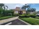 Well-maintained community pool gate with clear signage amidst lush landscaping for a secure experience at 3784 Parkridge Cir # 22-203, Sarasota, FL 34243