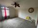 Empty bedroom with carpet flooring, vaulted ceiling, and natural light at 4111 34Th St E, Bradenton, FL 34208