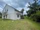 A single-Gathering home with a stucco exterior and a well-maintained lawn at 4111 34Th St E, Bradenton, FL 34208