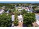 An aerial view captures the neighborhood homes surrounded by lush greenery at 4347 9Th N Ave, St Petersburg, FL 33713