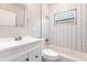 Bathroom featuring modern white vanity, subway tile, tub and a window with natural light at 4347 9Th N Ave, St Petersburg, FL 33713