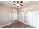 Bedroom featuring ceiling fan, and neutral walls with wood flooring and closet space at 4347 9Th N Ave, St Petersburg, FL 33713