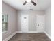 Bedroom with modern flooring, ceiling fan, and neutral walls, with window providing natural light at 4347 9Th N Ave, St Petersburg, FL 33713