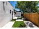 The driveway has turf accents and a garage for secure parking at 4347 9Th N Ave, St Petersburg, FL 33713