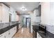 Spacious kitchen features granite counters, stainless appliances, white cabinets, and subway tile backsplash at 4347 9Th N Ave, St Petersburg, FL 33713