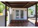 Covered patio featuring tiled flooring and stylish French doors providing natural light at 4347 9Th N Ave, St Petersburg, FL 33713