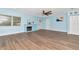 Inviting living room showcasing a decorative brick fireplace, neutral decor, and modern flooring at 4512 26Th S Ave, Tampa, FL 33619