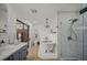 Updated bathroom features a claw foot tub, tiled shower, and custom vanity at 4636 Pine Harrier Dr, Sarasota, FL 34231