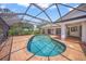 Lovely pool with screened enclosure, offering privacy and protection from the elements at 4636 Pine Harrier Dr, Sarasota, FL 34231
