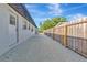 Backyard featuring gravel area, privacy fence, and the exterior of the house at 4812 21St W St, Bradenton, FL 34207
