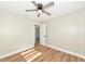 The bedroom is bright with natural light and features wood-look flooring at 4812 21St W St, Bradenton, FL 34207