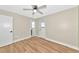 Bedroom features include light walls, wood-look flooring, ceiling fan, and a window at 4812 21St W St, Bradenton, FL 34207