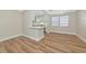 Bright dining area shows modern light fixture and flows into the open kitchen area at 4812 21St W St, Bradenton, FL 34207