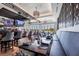 Community bar and dining area with television at 5217 Chase Oaks Dr, Sarasota, FL 34241