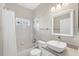 This bathroom offers a shower and tub combination, complemented by a vanity with a sink at 5217 Chase Oaks Dr, Sarasota, FL 34241