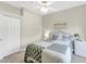 This bedroom offers comfort with a bright window providing natural light at 5217 Chase Oaks Dr, Sarasota, FL 34241