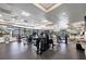 The community gym features a variety of weight training and cardio equipment, ceiling fans and multiple tv screens at 5217 Chase Oaks Dr, Sarasota, FL 34241