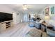 Inviting living room with modern flooring, comfortable furniture, and an open floor plan at 5234 Lake Arrowhead Trl # 30, Sarasota, FL 34231