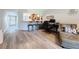Bright living area with modern floors and a convenient bar top overlooking the kitchen at 5234 Lake Arrowhead Trl # 30, Sarasota, FL 34231