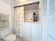 Modern bathroom featuring a walk-in tub with built-in shelving for toiletries and easy accessibility at 5234 Lake Arrowhead Trl # 30, Sarasota, FL 34231