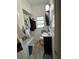 Cozy bathroom with a tub, vanity, and storage cabinet; presents a functional and space-efficient design at 6013 Idle A While Cir, Dade City, FL 33523