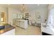 This well-lit craft room features a center island, sewing machines, and mirrored closet doors at 6102 Sonesta Ct, Bradenton, FL 34202