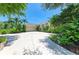 Charming single Gathering home with a long drive, mature trees, and meticulous landscaping at 6102 Sonesta Ct, Bradenton, FL 34202