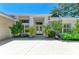 Beautiful single Gathering home with a long drive, mature trees, and meticulous landscaping at 6102 Sonesta Ct, Bradenton, FL 34202