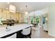 Spacious kitchen island and breakfast bar, open to the dining area and natural light at 6102 Sonesta Ct, Bradenton, FL 34202