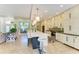 Spacious kitchen with an island, bar seating, and modern appliances at 6102 Sonesta Ct, Bradenton, FL 34202