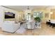 Inviting living room with comfortable seating, tile floors and natural light. Features views to the kitchen at 6102 Sonesta Ct, Bradenton, FL 34202