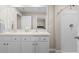Bathroom boasts dual sinks, ample countertop space and a shower-tub combo at 6314 Distant Haze Pl, Palmetto, FL 34221