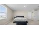 Spacious bedroom with neutral walls, a large window and plush carpeting at 6314 Distant Haze Pl, Palmetto, FL 34221