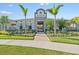Community entrance featuring stone accents, manicured landscaping, and a welcoming entryway at 6314 Distant Haze Pl, Palmetto, FL 34221