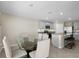 Spacious kitchen and dining area with stainless appliances and granite countertops at 6314 Distant Haze Pl, Palmetto, FL 34221