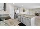 Spacious kitchen with granite counters, stainless appliances, and eat-in island at 6314 Distant Haze Pl, Palmetto, FL 34221