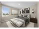 Comfortable main bedroom with a neutral color palette and ample natural light at 6314 Distant Haze Pl, Palmetto, FL 34221