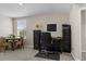 Versatile room with a dining area, office space, carpet flooring, natural light, and neutral-toned walls at 6314 Distant Haze Pl, Palmetto, FL 34221