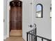 Interior view of an elevator with paneled wood and recessed lighting at 641 Ranger Ln, Longboat Key, FL 34228