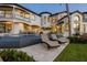Resort-style backyard with pool, spa, and lush landscaping at 641 Ranger Ln, Longboat Key, FL 34228