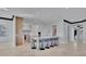Open concept kitchen with large island, breakfast bar, modern appliances, and ample counter space at 641 Ranger Ln, Longboat Key, FL 34228