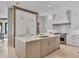 Gourmet kitchen with a large island, modern appliances, and bright, airy atmosphere at 641 Ranger Ln, Longboat Key, FL 34228
