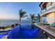 Picturesque pool with stunning waterfront views and inviting lounge area at 641 Ranger Ln, Longboat Key, FL 34228